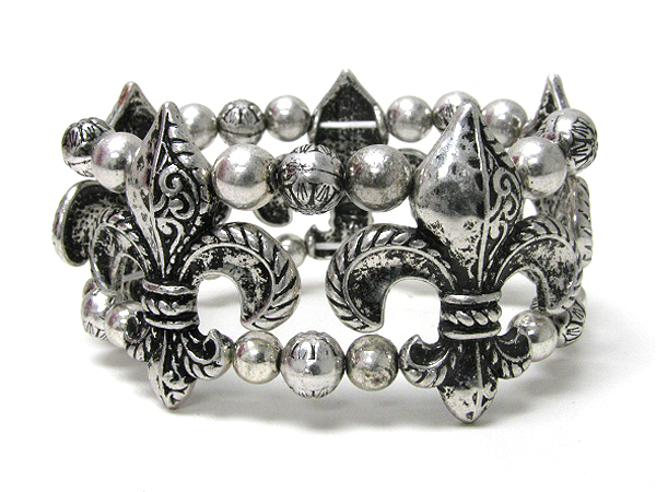 Multi metal filigree fluer de lis link stretch bracelet