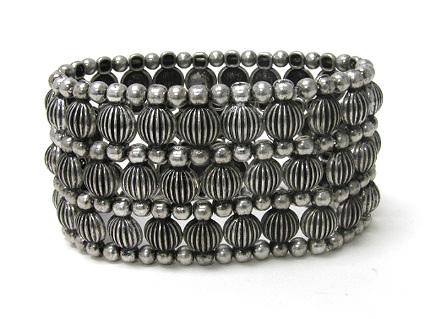 Multi combed metal ball link stretch bracelet