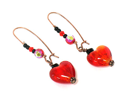 Dangling glass heart earring