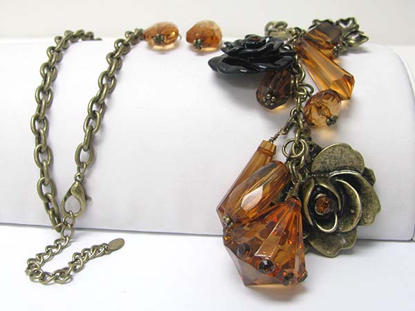 Chunky glass stone and metal flower dfangle long chain necklace earring set