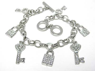 Multi crystal key and lock charm toggle bracelet