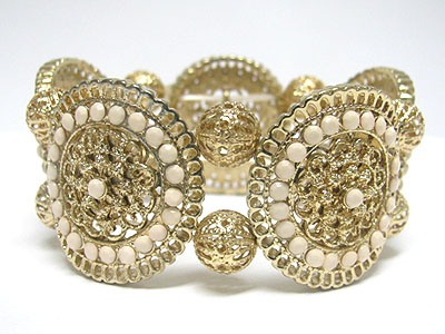 Metal filigree round disk link stretch braceelt