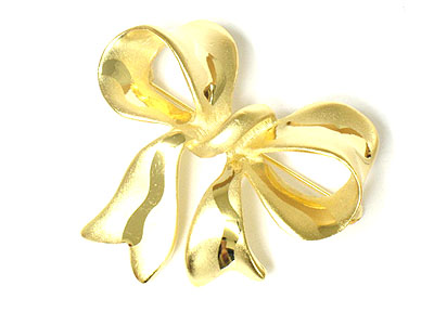 Metal ribbon brooch