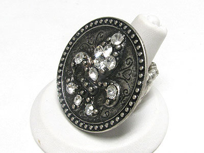 Crystal fleur de lis round metal stretch ring