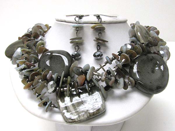 Multi figurine and chip stone necklace earring set