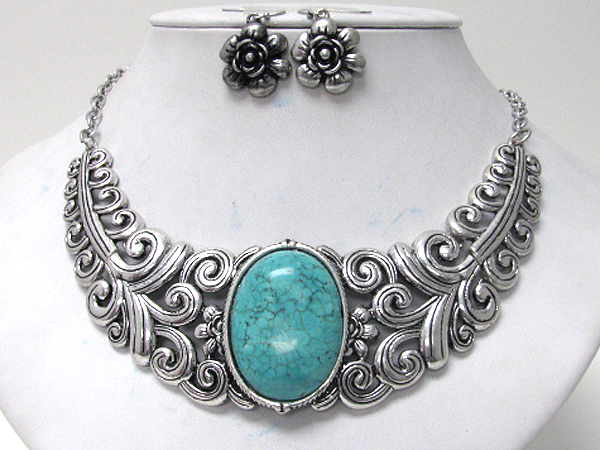 Large turtuoise center and metal filigree necklace earring set