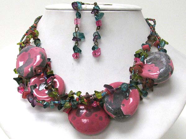 Multi figurine disk and chip stone necklace earring set