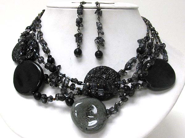 Multi figurine disk and chip stone necklace earring set