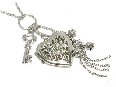 Filgree heart locket and multi charm necklace