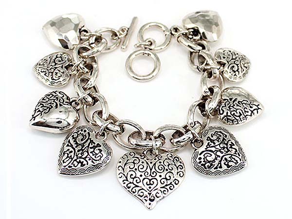 Multi metal casting heart charm bracelet