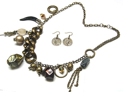 Various burnish metal chain and multi charm necklace and coin earring set