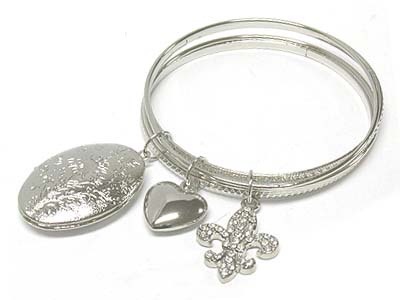 Metal oval locket and heart and fleur de lis charm bangle