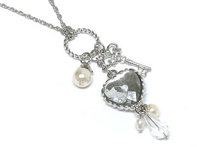 Facet cut stone pave heart and crystal deco key charm necklace