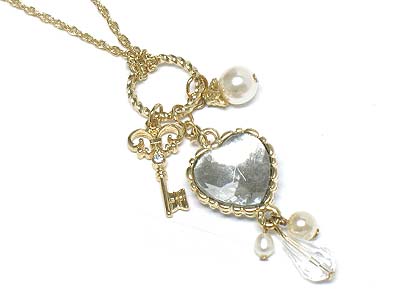 Facet cut stone pave heart and crystal deco key charm necklace