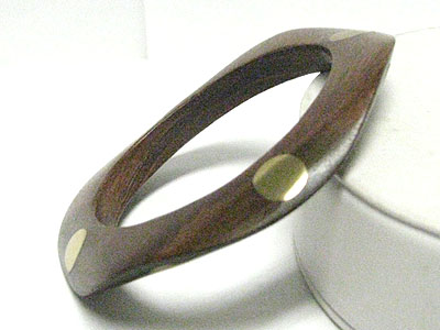 Metal stud carved wood bangle