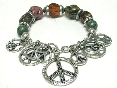 Patina stone and metal peace mark charm stretch bracelet