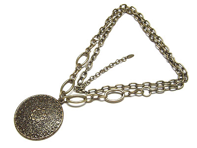 Filegree round metal pendant and lonf metal chain necklace