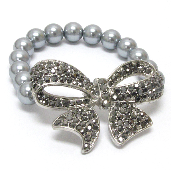 Crystal ribbon or bow and pearl stretch bracelet