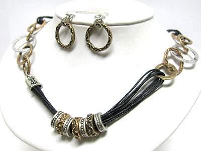 Tri tone metal ring and multi cord necklace earring set