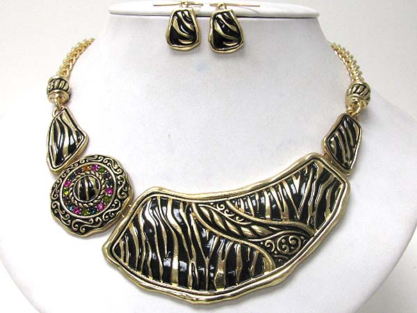 Metal filigree and animal print necklace earring set