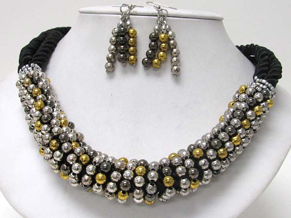 Metal beads line wrapped rope backing necklace earring set