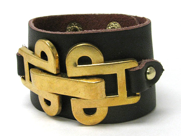 Metal art deco on synthetic leather wrist band