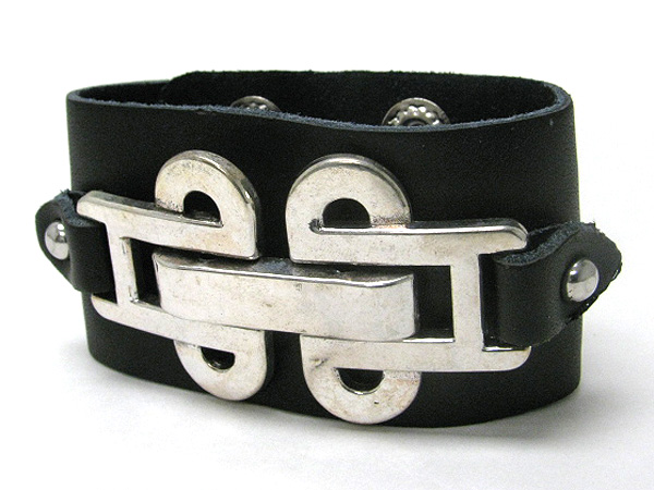 Metal art deco on synthetic leather wrist band