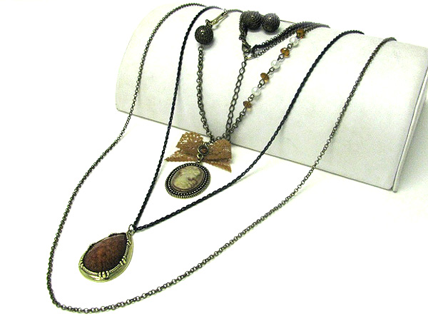 Cameo and ribbon pendant multi layered chain long necklace earring set