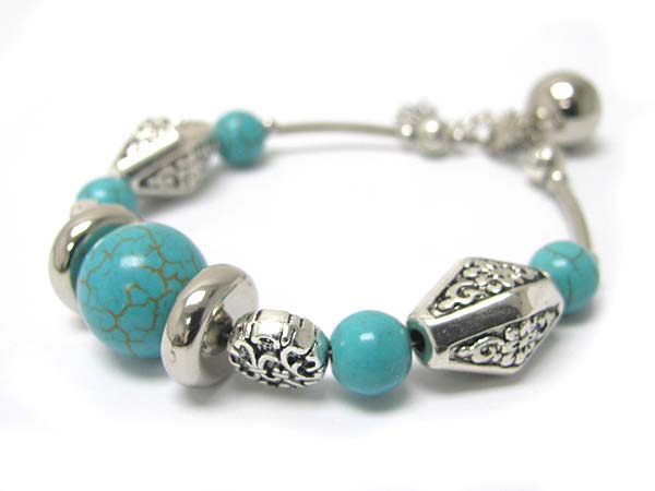 Turquoise stone and filigree metal link bracelet