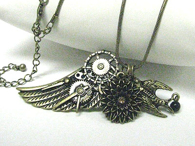 Burnish metal flower bird wing drop long necklace