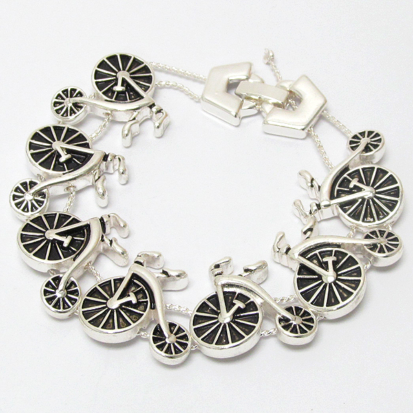 Sliding fold over clasp bicycle theme bracelet