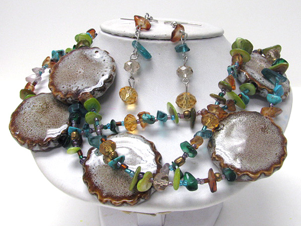 Multi figurine disk and chip stone necklace earring set