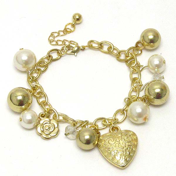 Textured puffy heart and pearl and metal ball dangle bracelet