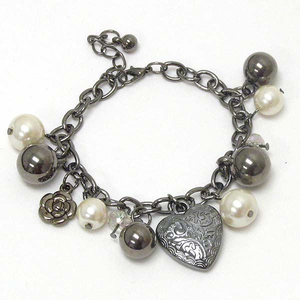 Textured puffy heart and pearl and metal ball dangle bracelet