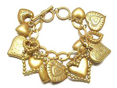 Multi filegree heart charm dangle toggle bracelet