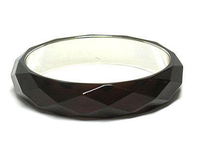 Facet glass and metal inside bangle