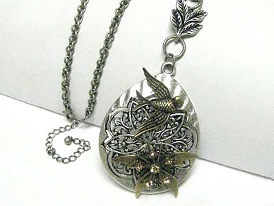 Burnish metal flower and bird oval pendant long necklace