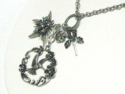 Burnish metal flower and bird deco pendant long necklace