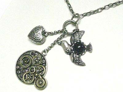 Burnish metal heart and bird drop long necklace