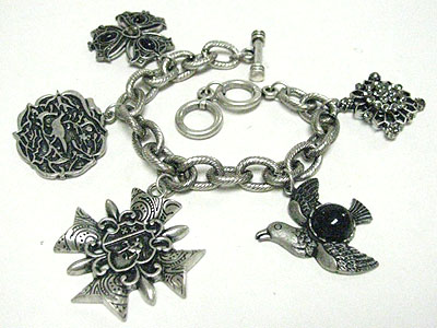 Antique style crystal stud flower and bird charm toggle bracelet