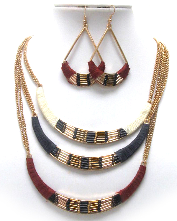 Triple layer fabric deco long necklace earring set