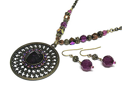 Metal filigree round pendant and beads sting necklace and earring set