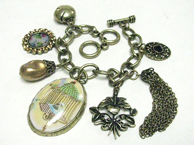 Antique style multi charm toggle bracelet