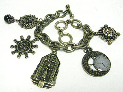 Antique style clock and multi charm toggle bracelet