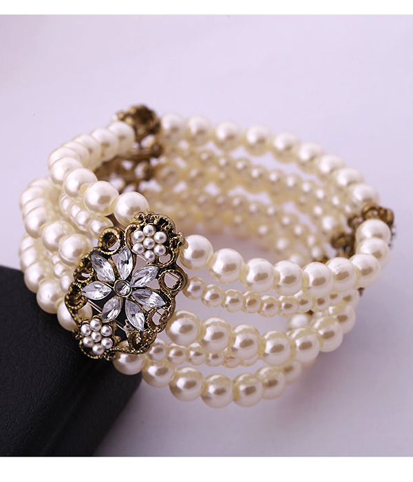 Boutique style multi layer pearl stretch bracelet