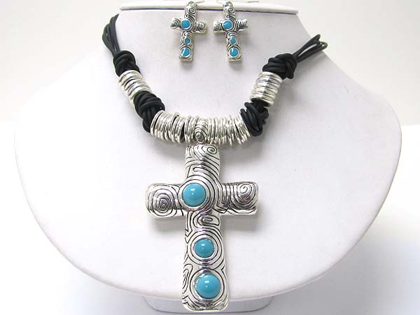 Stone deco textured metal cross pendant multi ring and braided cord necklace earring set