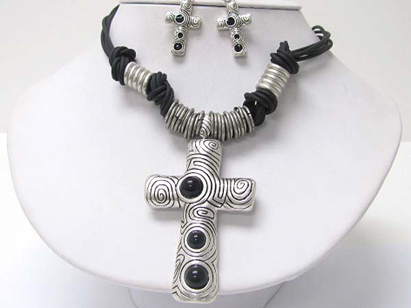 Stone deco textured metal cross pendant multi ring and braided cord necklace earring set