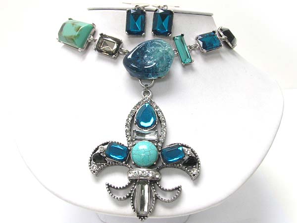 Crystal resin and glass stone fleur de lis medal dangle necklace earring set