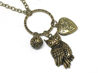 Metal owl and heart charm necklace