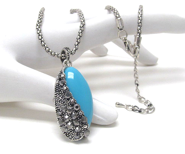 Crystal metal casting and oval acrylic stone necklace 